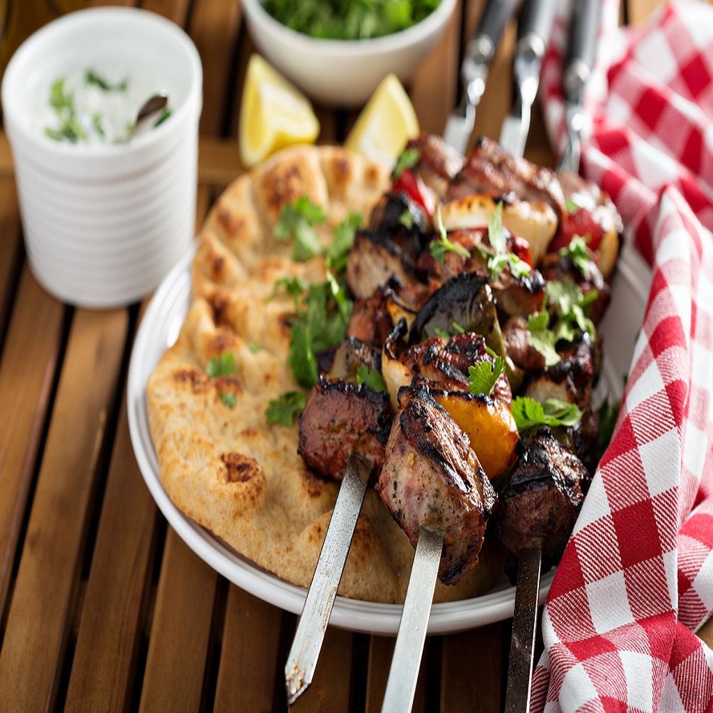 Lamb kebabs with flatbread, lemon and tzatziki sauce